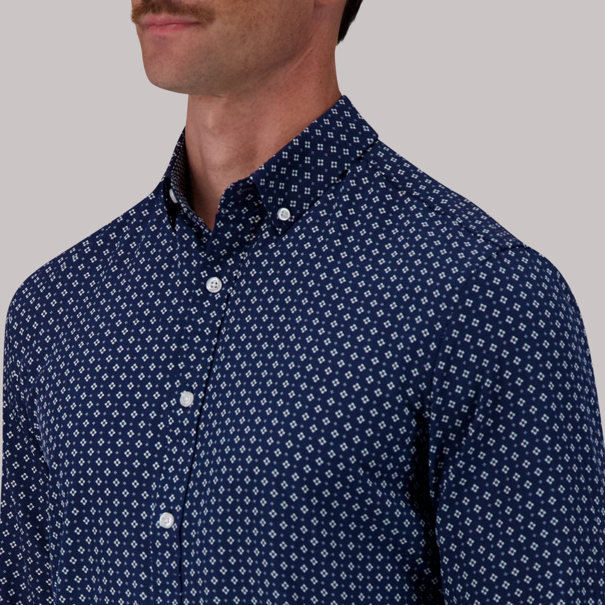 Model Front Close Up View of Long Sleeve 4-Way Sport Shirt with Floral Print in Navy