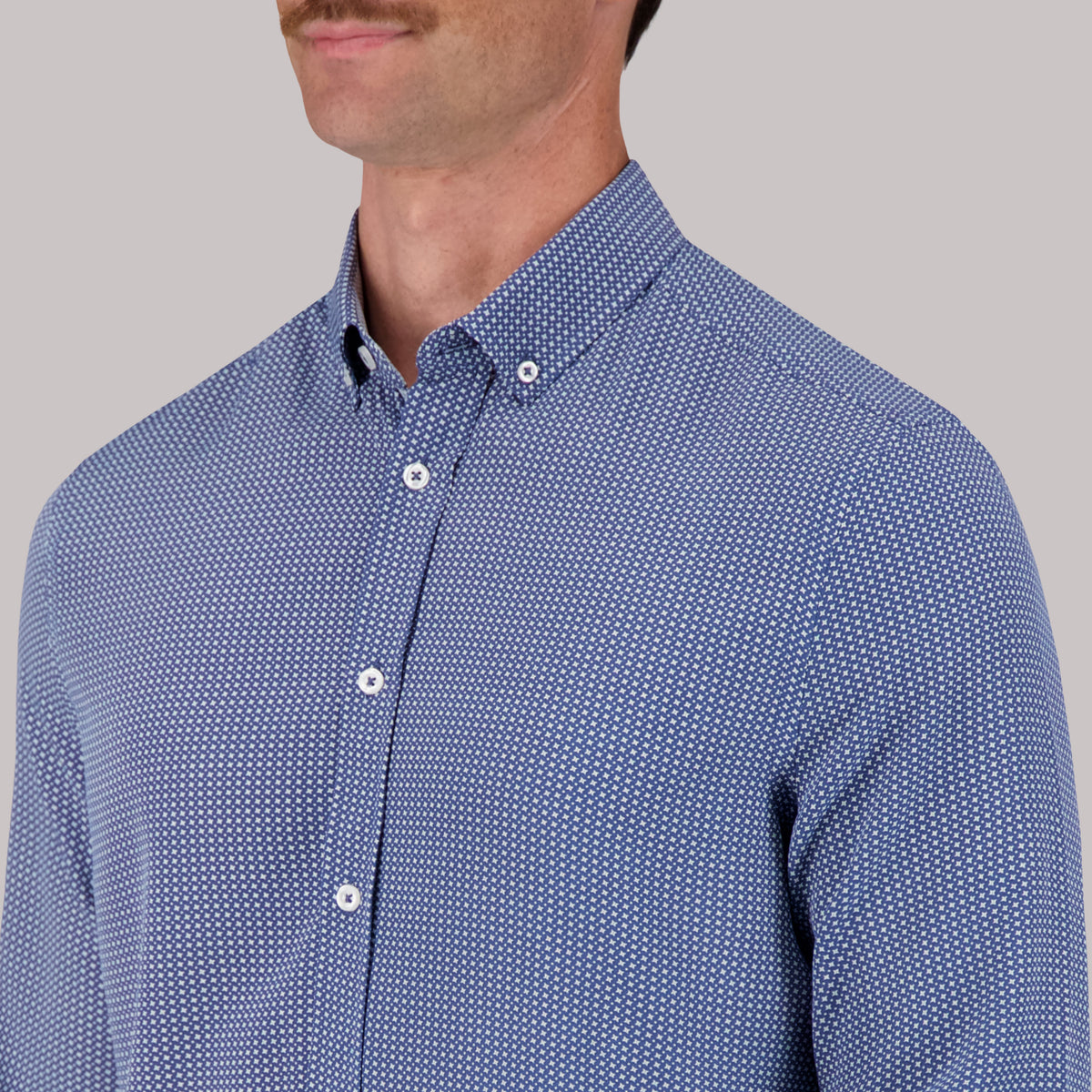 Model Front Close Up View of Long Sleeve 4-Way Sport Shirt with Geometric Print in Cobalt