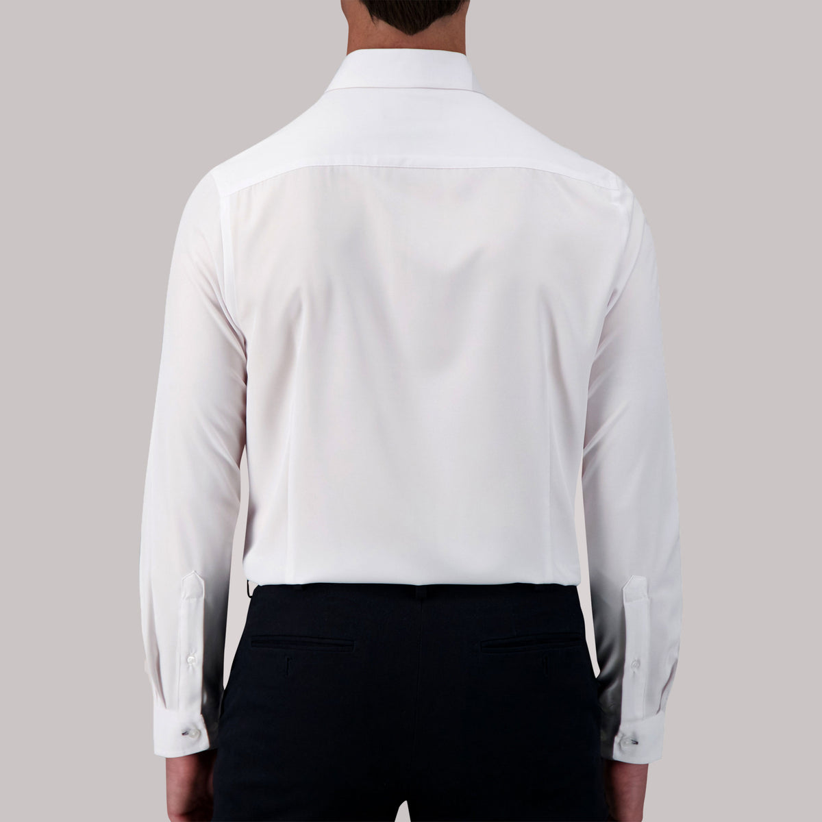 Model Back View of Long Sleeve 4-Way Stretch Dress Shirt in White