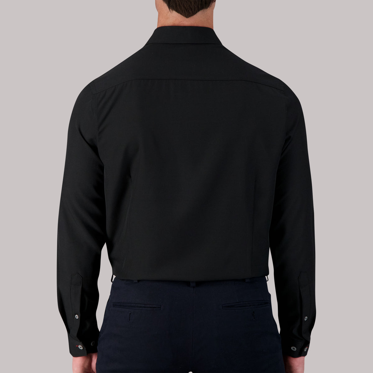 Model Back View of Long Sleeve 4-Way Stretch Dress Shirt in Black