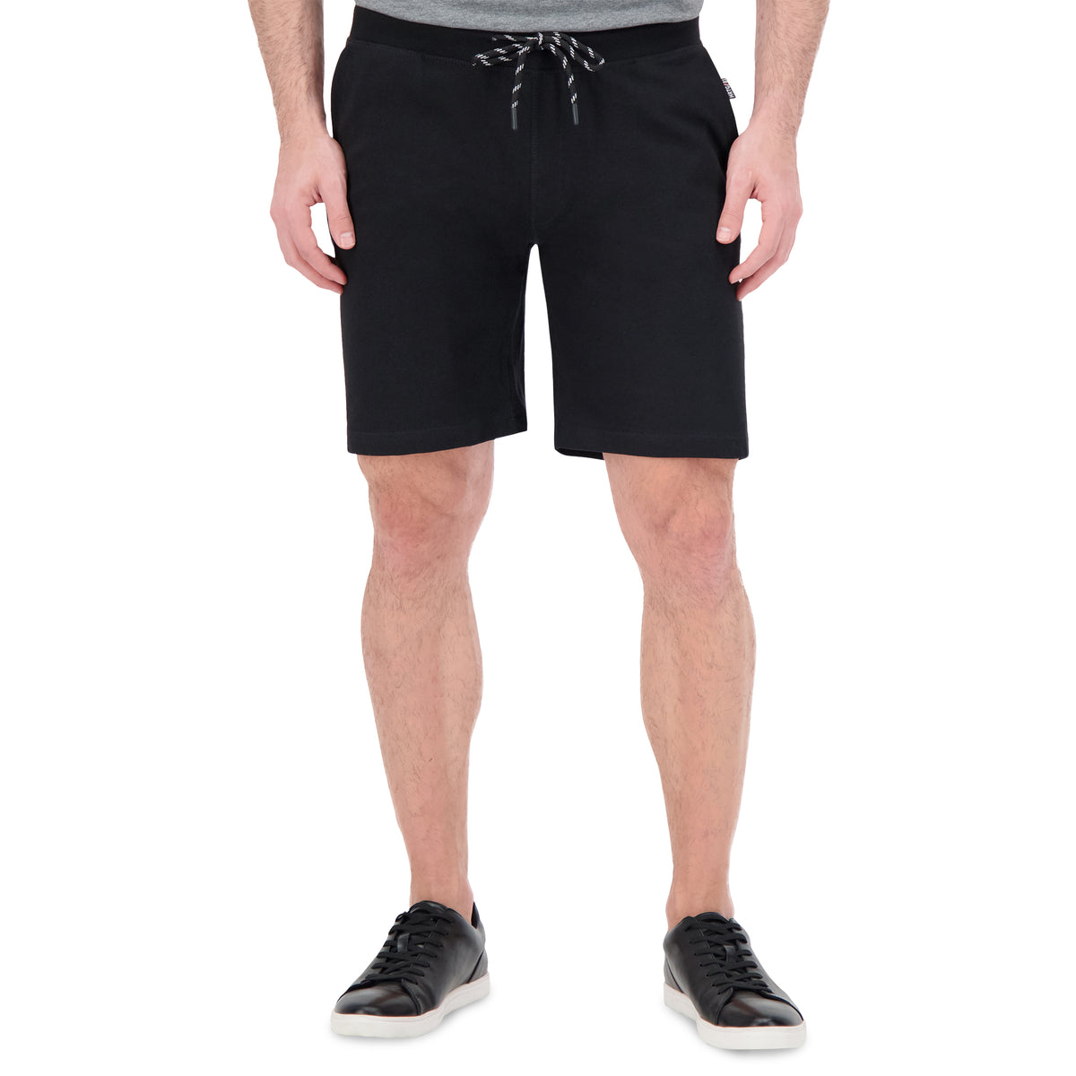 Model Front View of Knit Shorts in Black