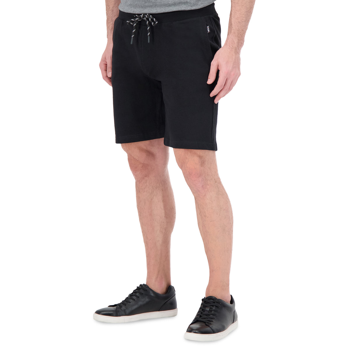 Model Side View of Knit Shorts in Black