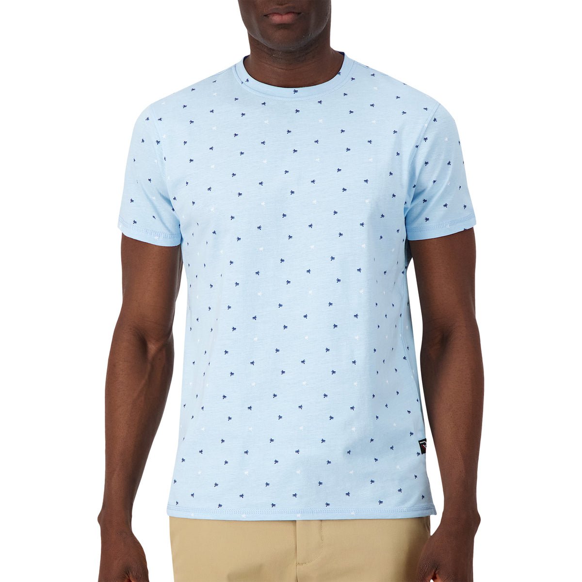 Model Front View of Short Sleeve Shirt with Palm Tree Print in Blue