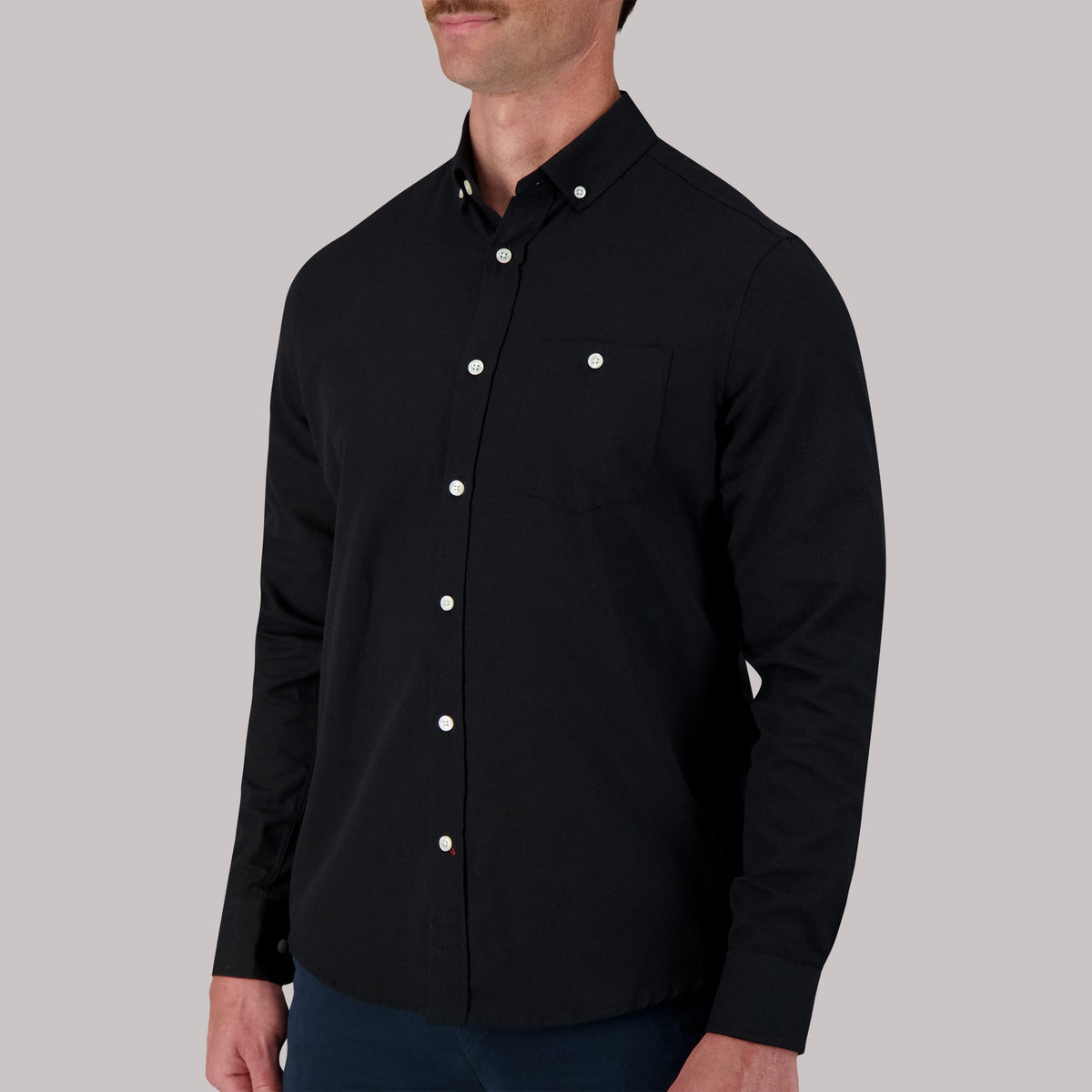 Model Side View of Long Sleeve Oxford Sport Shirt in Black