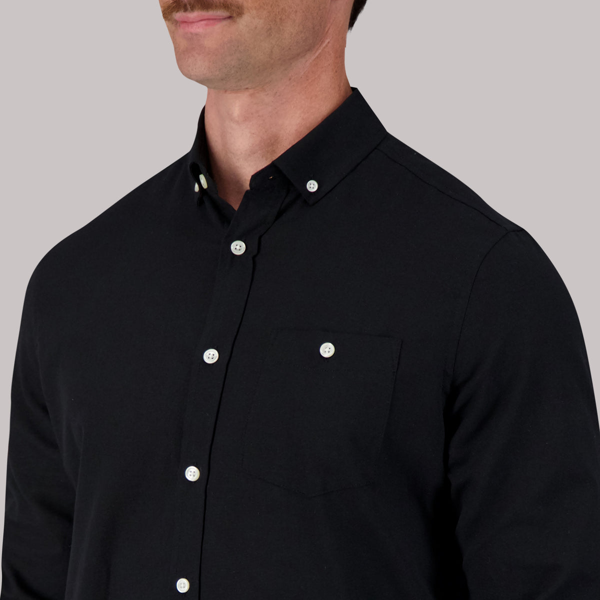 Model Front View Up Close of Long Sleeve Oxford Sport Shirt in Black