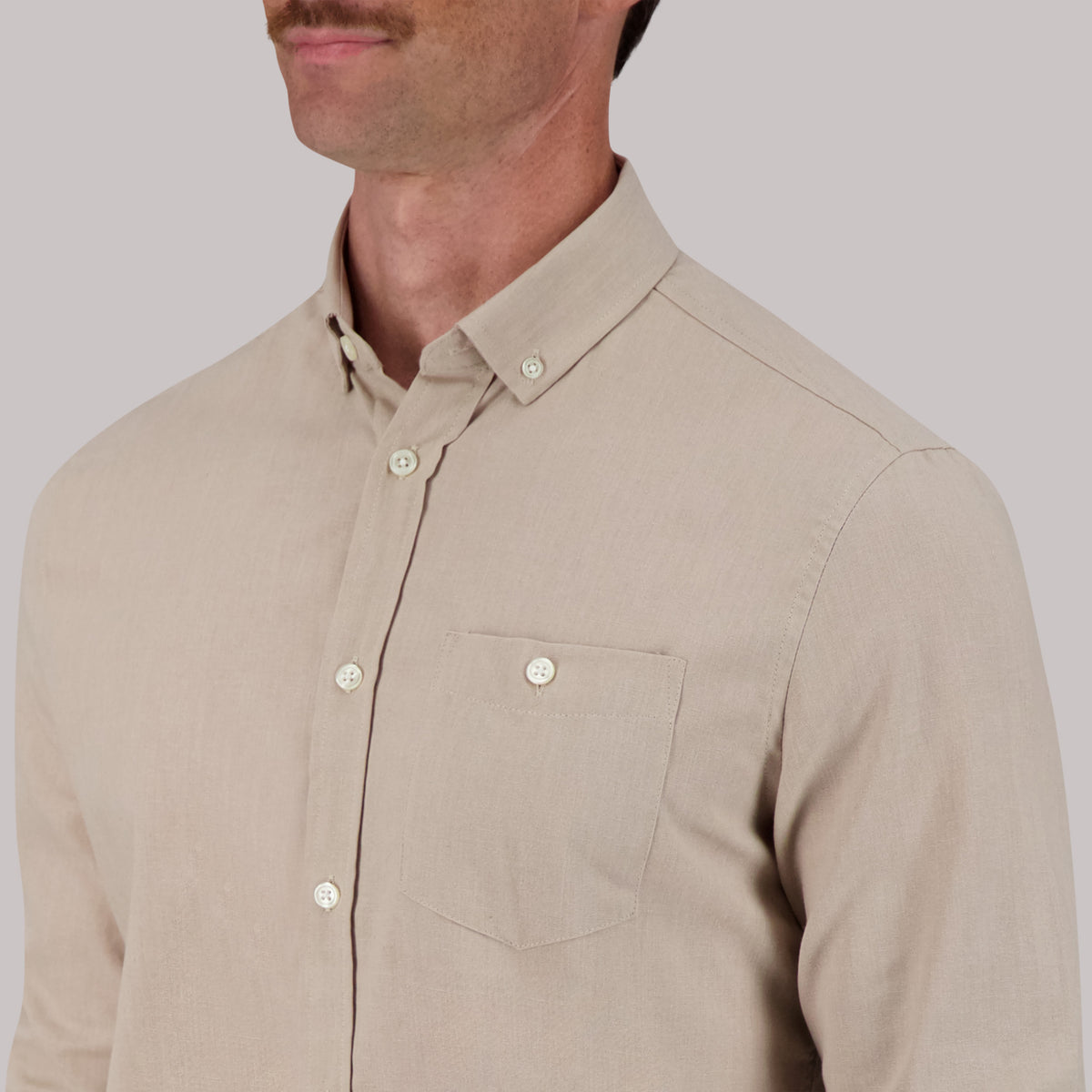 Model Front View Up Close of Long Sleeve Oxford Sport Shirt in Sand
