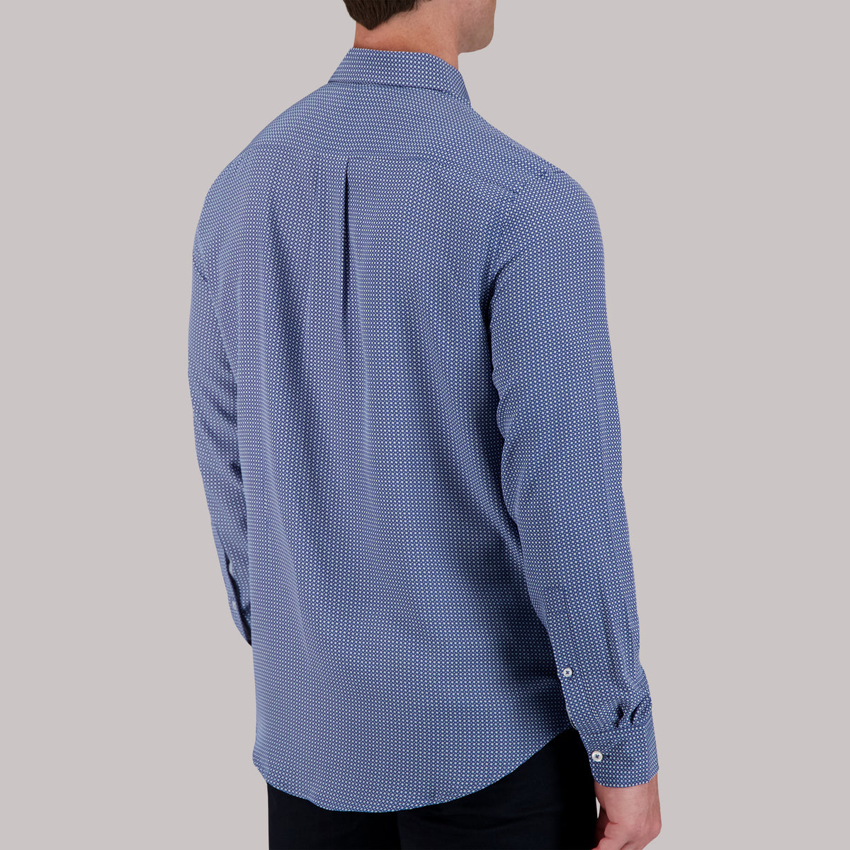 Model Back View of Long Sleeve 4-Way Sport Shirt with Geometric Print in Cobalt