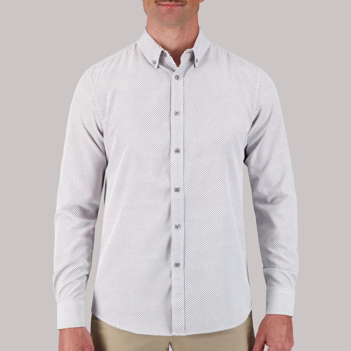 Model Front View of Long Sleeve 4-Way Sport Shirt with Geometric Print in White