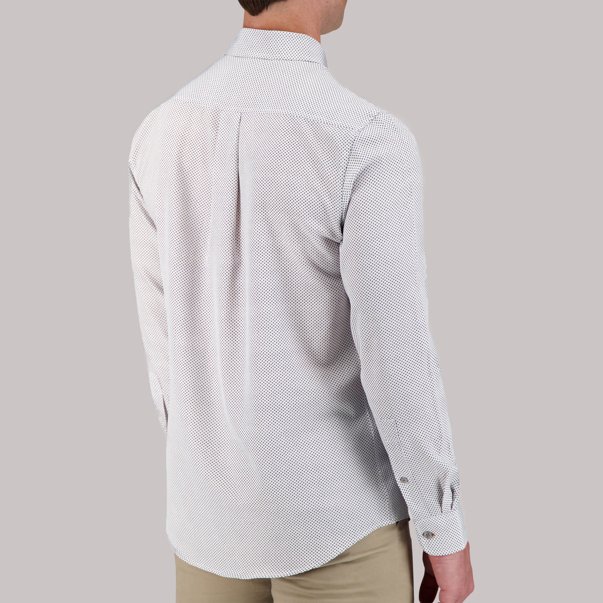 Model Back View of Long Sleeve 4-Way Sport Shirt with Geometric Print in White