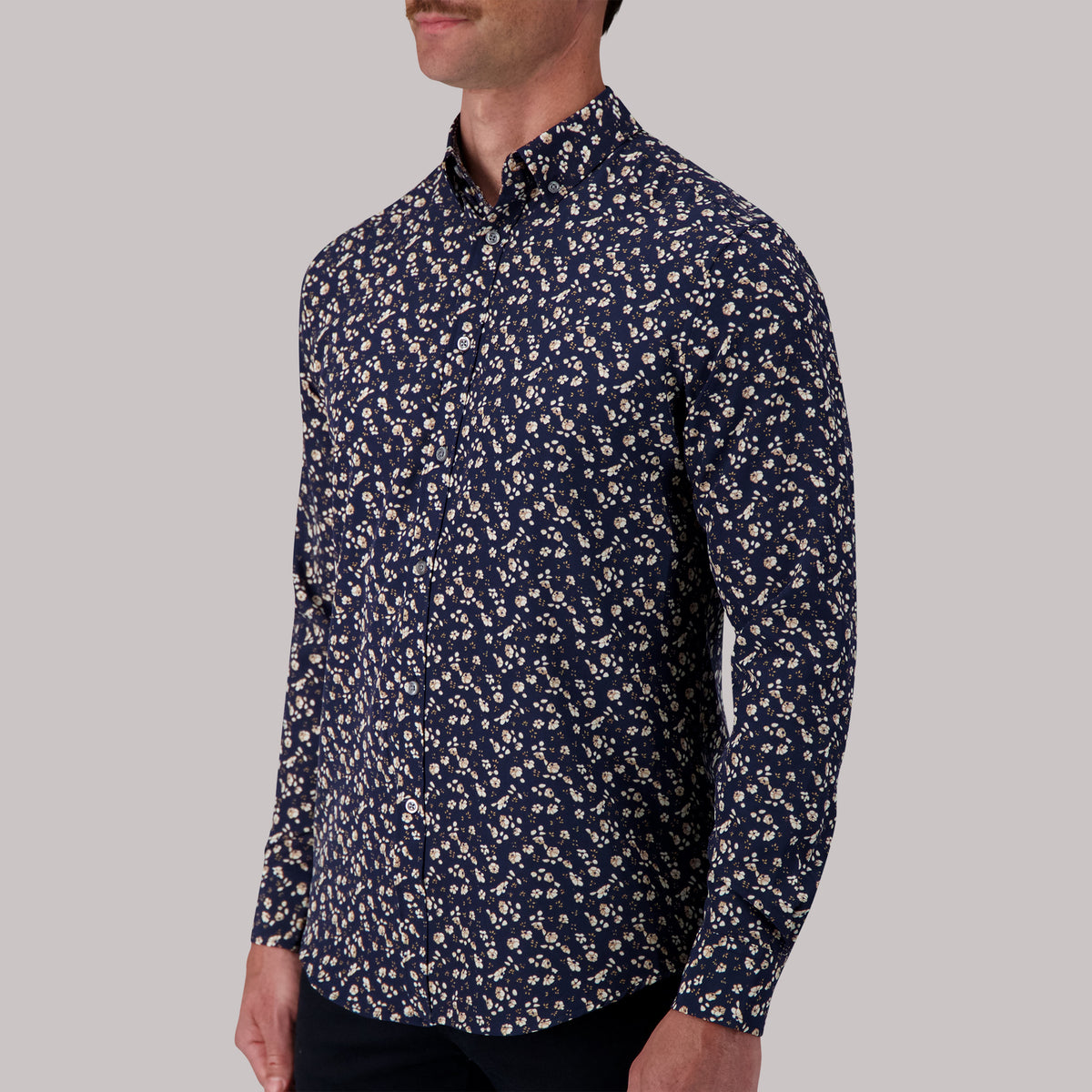 Model Side View of Long Sleeve 4-Way Sport Shirt with Floral Print in Navy