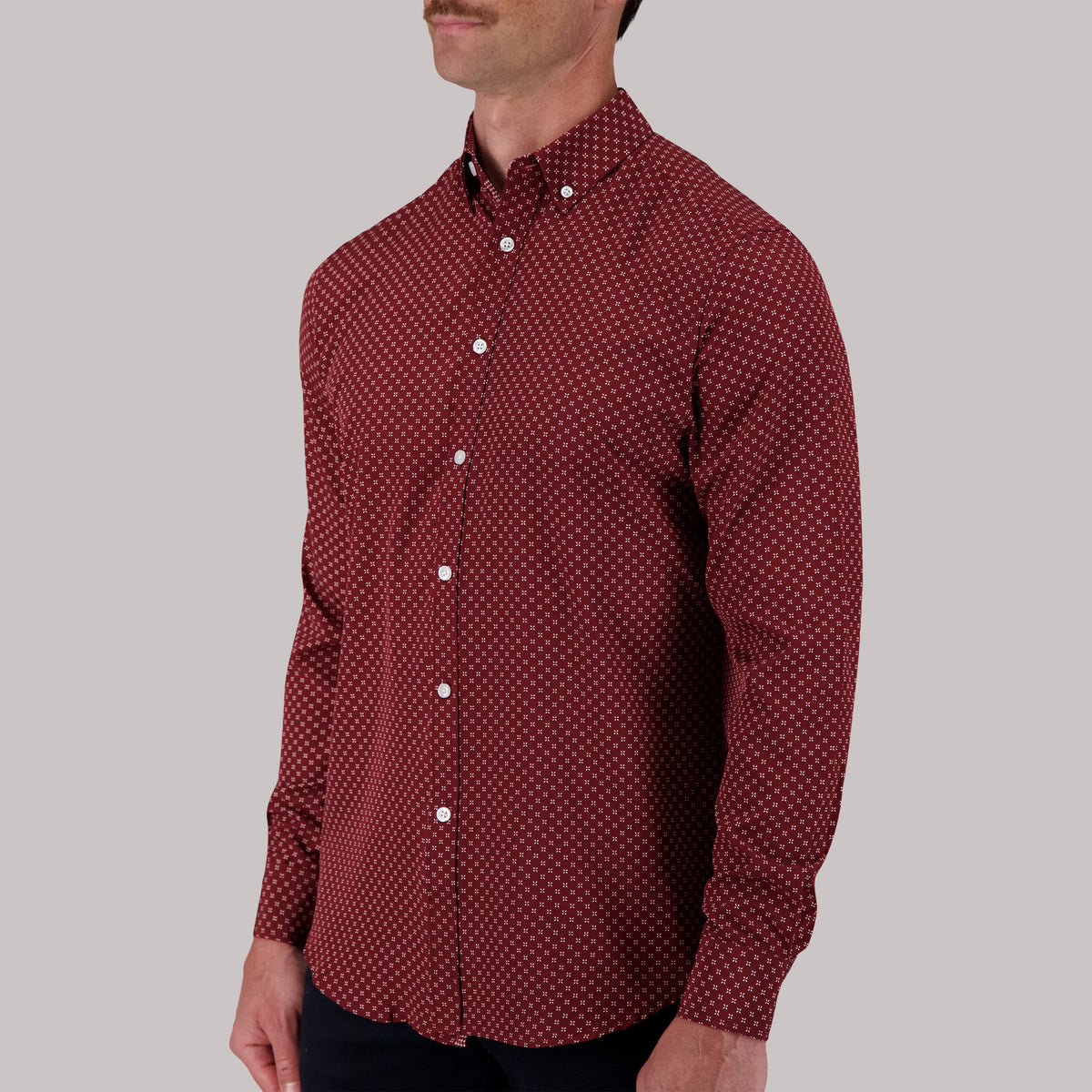Model Side View of Long Sleeve 4-Way Sport Shirt with Geometric Print in Burgundy